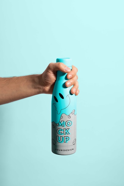 Thermo bottle mockup held in hand