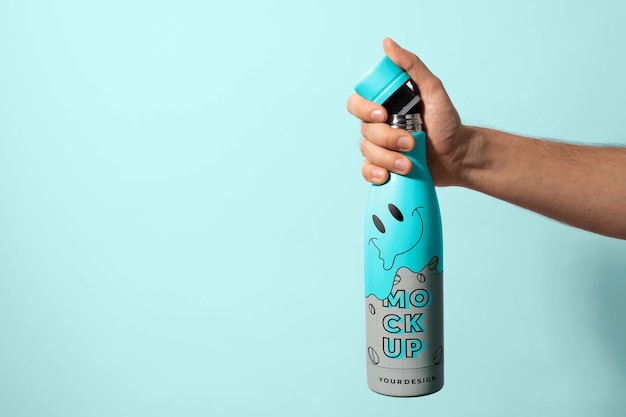 Thermo bottle mockup held in hand