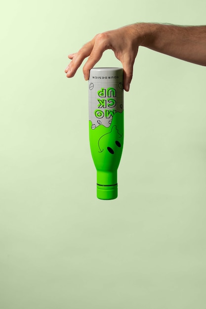 PSD thermo bottle mockup held in hand