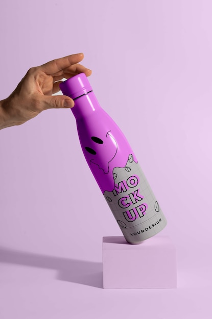 PSD thermo bottle mockup held in hand