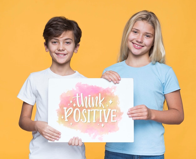 Think positive boy and girl mock-up