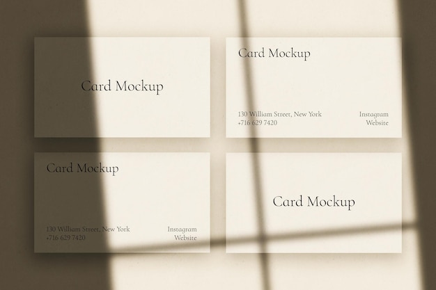 PSD three business cards with the words card mockup on the top left.