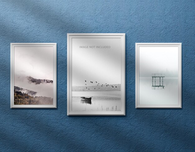 Three photo frame mockup on wall