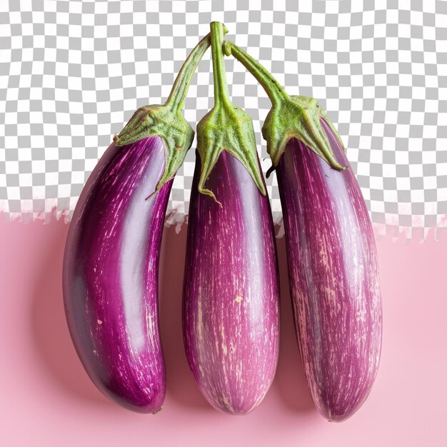 PSD three purple eggplant are on a pink background