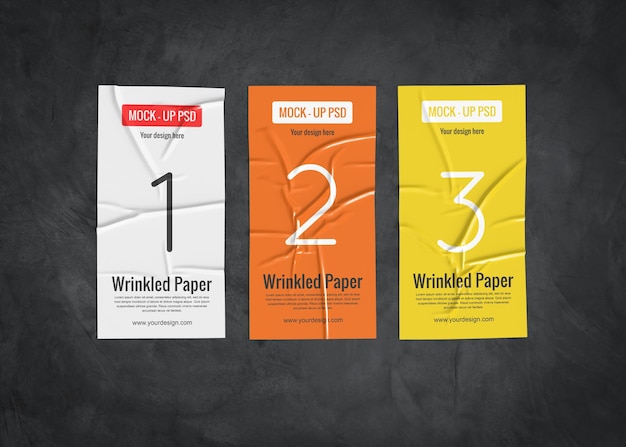 PSD three wrinkled paper mockup on a dark surface