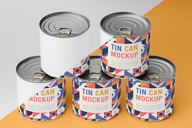 Tin cans arranged on table