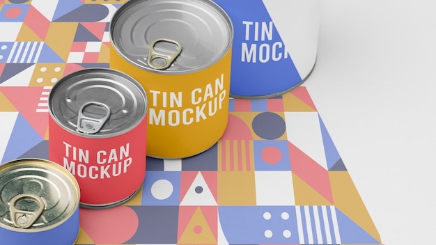 PSD tin cans arranged on table