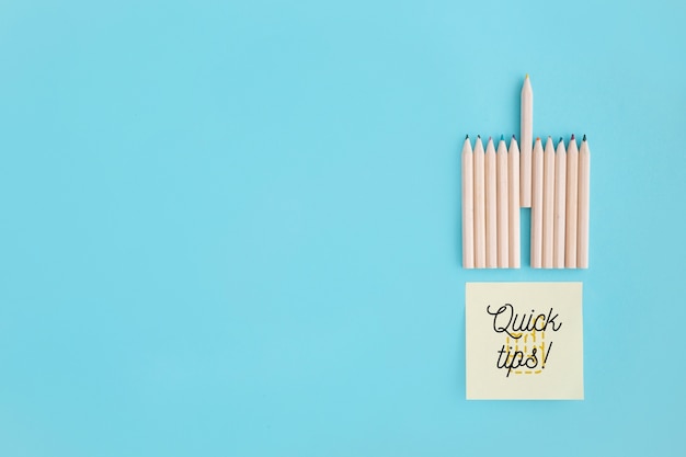 tips concept with sticky notes and pencils