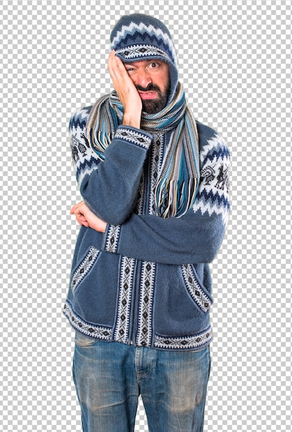 Tired man with winter clothes