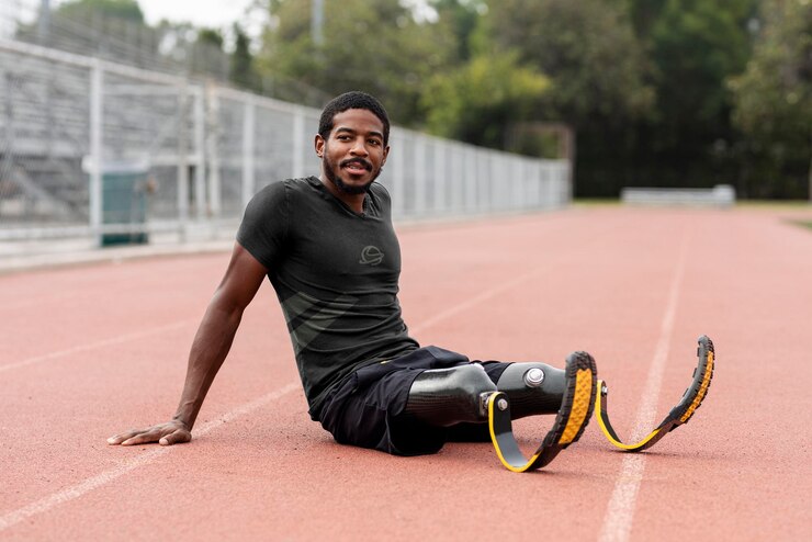 PSD top mockup on paralympic athlete relaxing by the running track psd