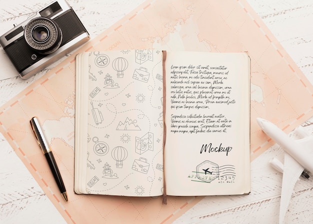 top view of agenda with airplane and camera for traveling