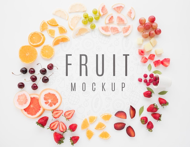 PSD top view assortment of organic fruits with mock-up