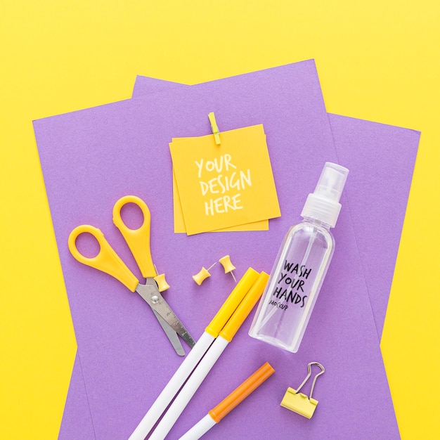 Top view of back to school items with scissors