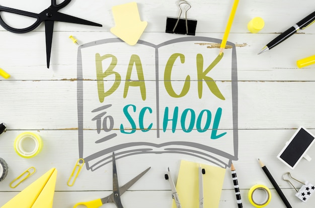 Top view back to school with wooden background