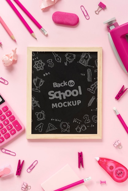 top view of blackboard with school supplies