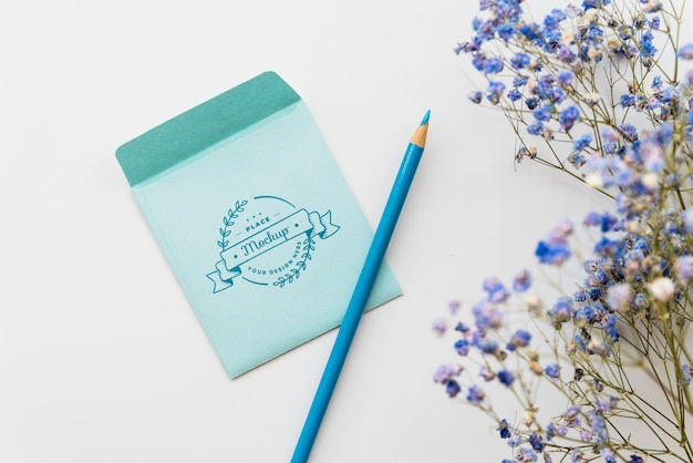 top view blue pencil and envelope