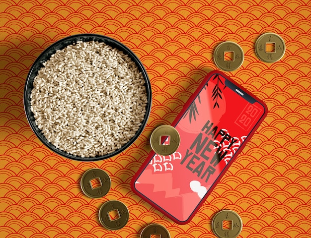 Top view bowl of rice golden coins and phone mock-up