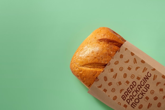 PSD top view bread packaging on green background