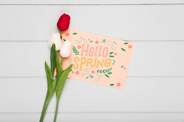 Top view of card with spring tulips