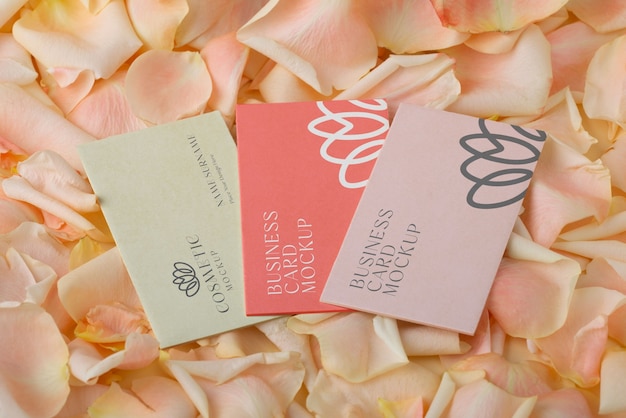 PSD top view cards on flower petals mockup