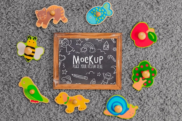 top view of children toys with chalkboard
