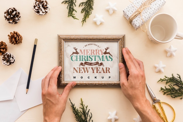 PSD top view christmas composition with frame mockup