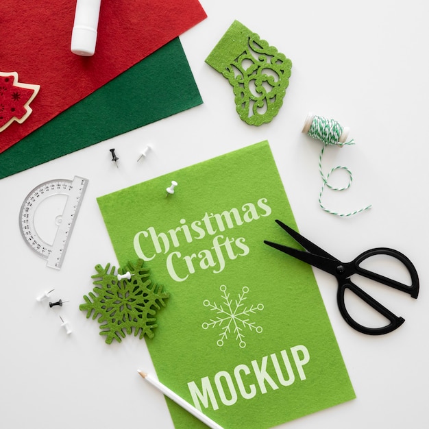 top view of christmas crafts with scissors