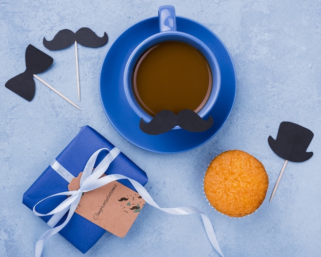 top view of coffee and gift for fathers day