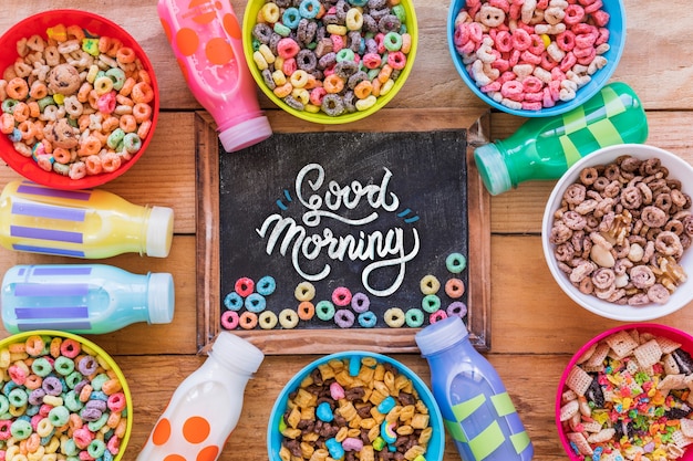 PSD top view of colorful cereals on wooden table