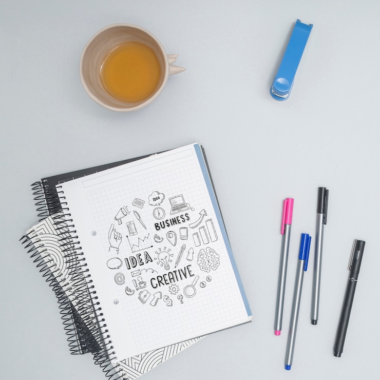 PSD top view colorful pens with lettering