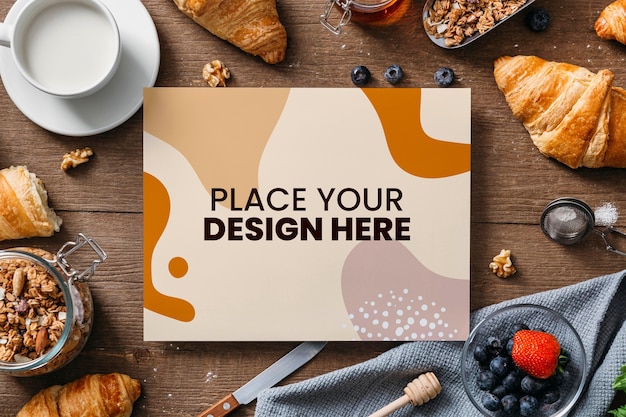 Top view on cooking book mockup design near pastries