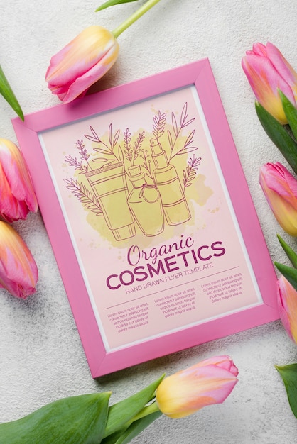 PSD top view cosmetics mockup with flowers