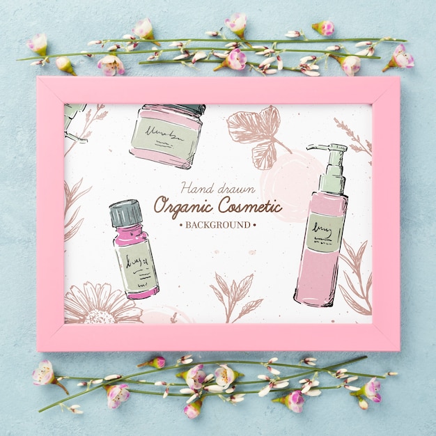top view cosmetics mockup with flowers