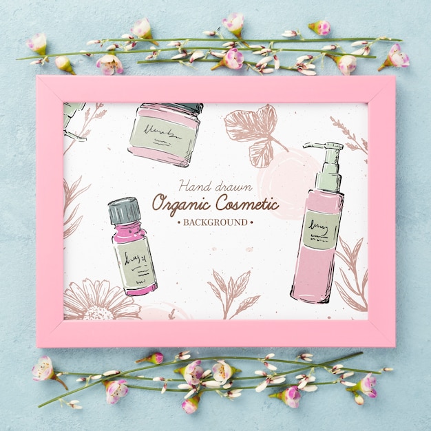 Top view cosmetics mockup with flowers