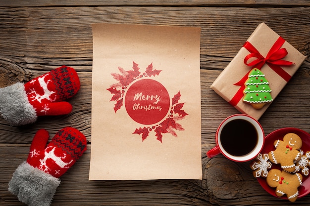 top view cup of coffee with gingerbread and gift boxes