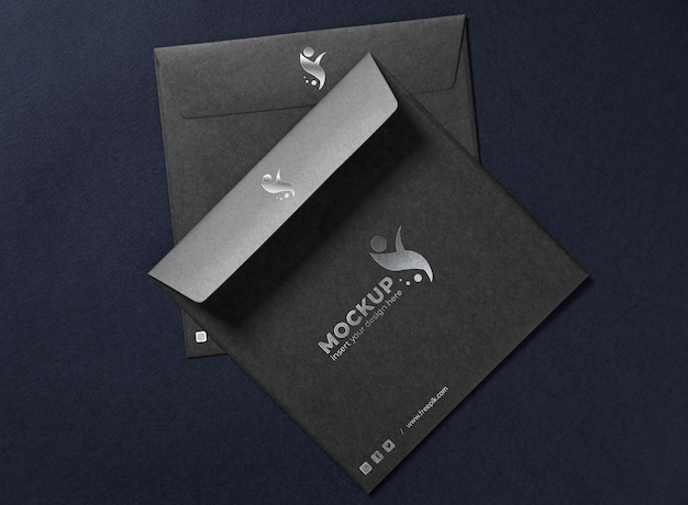 Top view over dark envelope mockup design