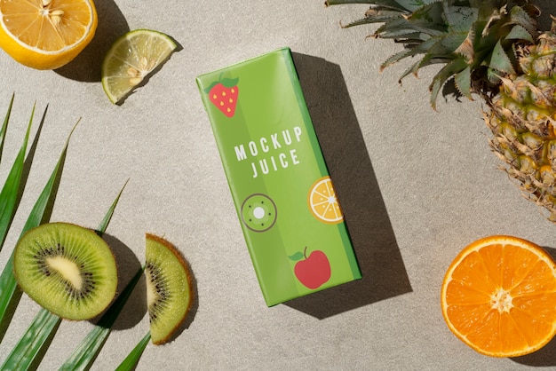 PSD top view delicious juice box and kiwi