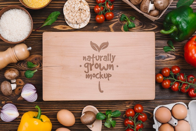 PSD top view delicious veggies vegan food mock-up