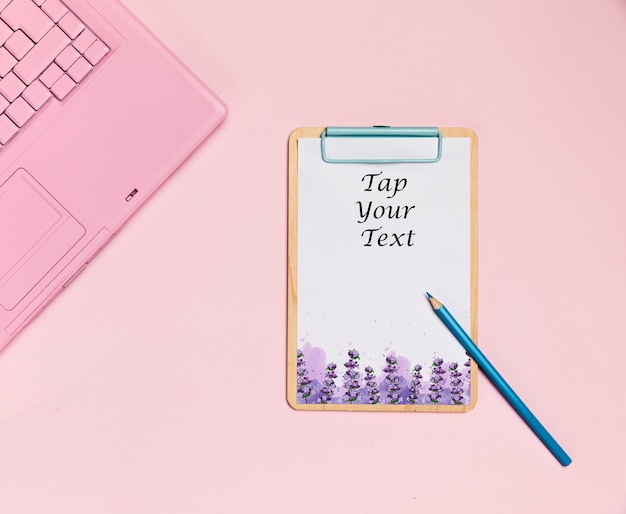 Top view desk concept with mock-up clipboard