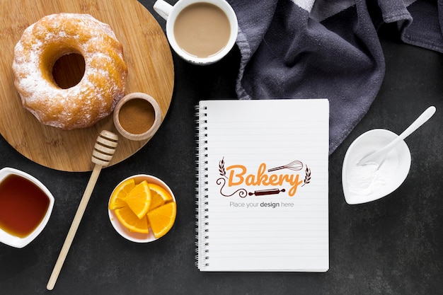 Top view of donuts with coffee and fruit