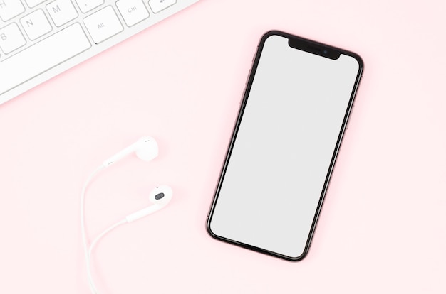 PSD top view earphones and smartphone mock-up