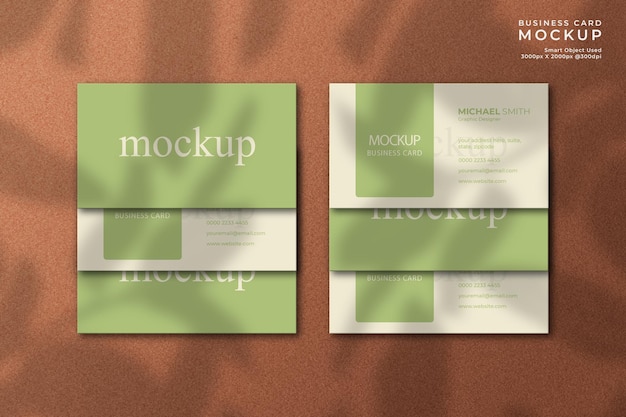 Top view elegant and modern business card mockup with texture background and natural leaf shadow