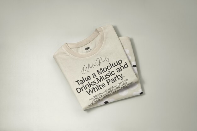 PSD top view on folded tshirt mockup