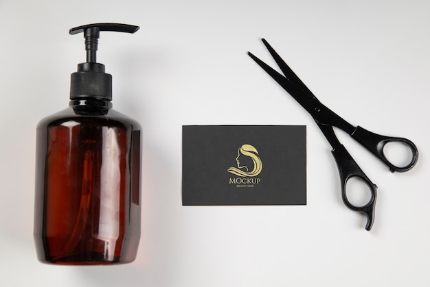 Top view hair products and business card