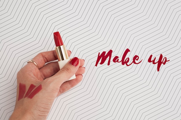 top view of hand and lipstick mock-up