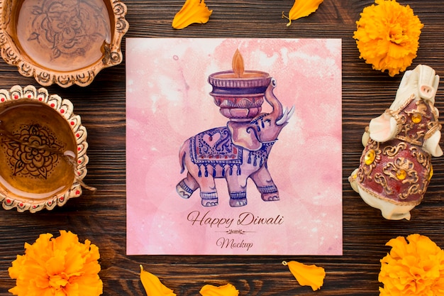 Top view happy diwali festival mock-up elephant and flowers