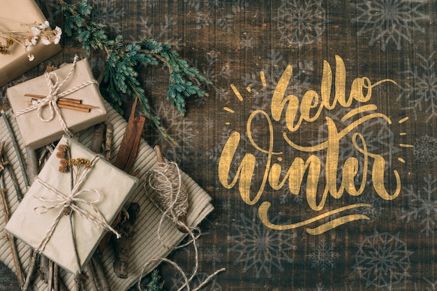 top view hello winter with white gift boxes