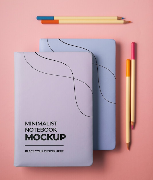 PSD top view of journal mock-up with colorful stationery