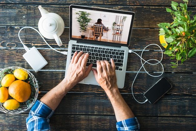 Top view laptop mockup with fruits