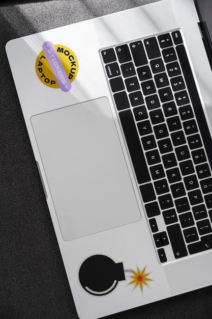 PSD top view laptop sticker mockup